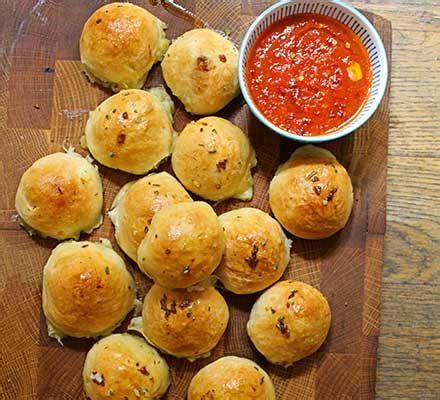 Cheese Stuffed Garlic Dough Balls With A Tomato Sauce Dip Cheese Stuffed Garlic Dough Balls With A Tomato Sauce Dip