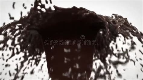 Chocolate Fountain Flowing Rich Dark Brown Liquid In Dynamic Cascades Chocolate Fountain Flowing Rich Dark Brown Liquid In Dynamic Cascades