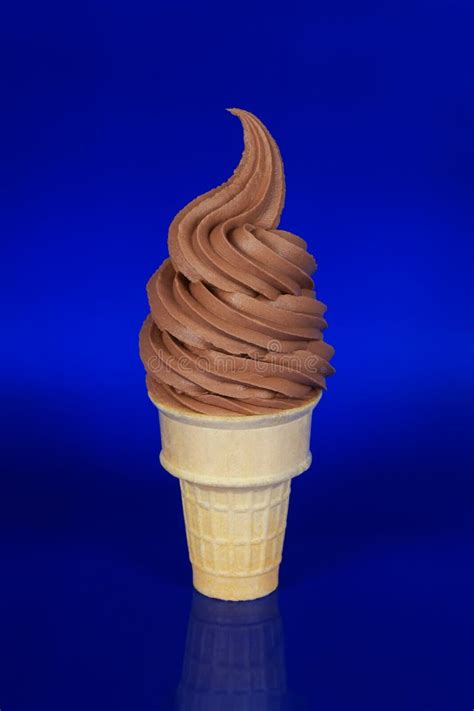 Chocolate Soft Serve Ice Cream On A Blue Background Stock Image Image